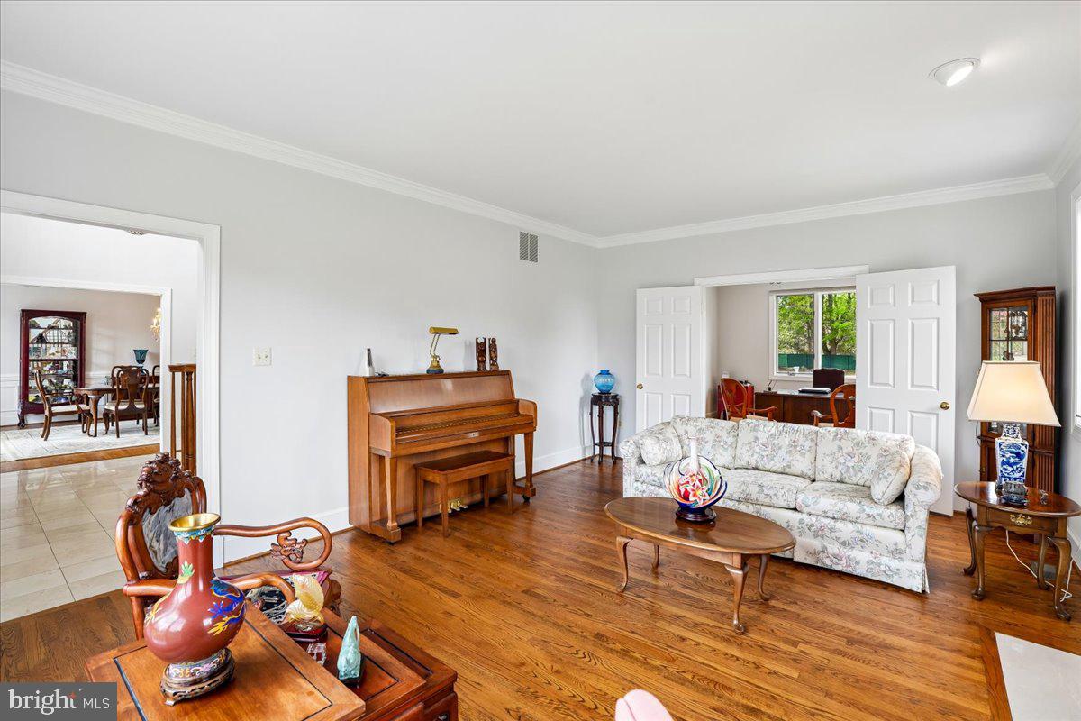 12640 Travilah Road Potomac, MD 20854 - Photo 10 of 56 Formal Living Room with Wood Fireplace