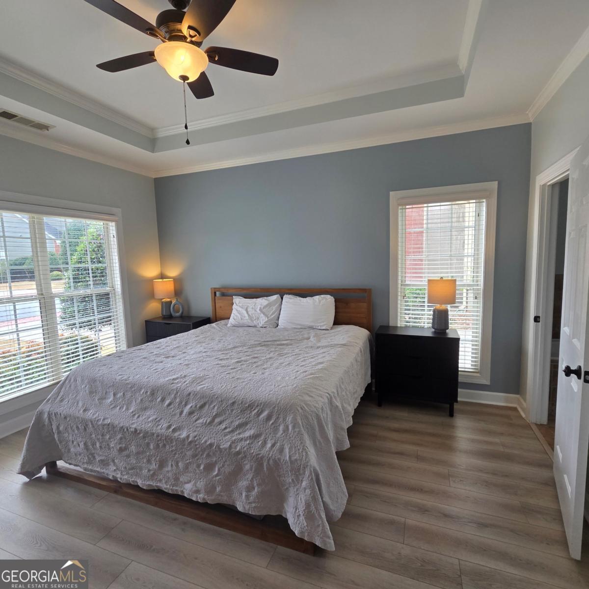 105 Cottage Grove Peachtree City, GA 30269 - Photo 12 of 13 a bedroom with a bed and window