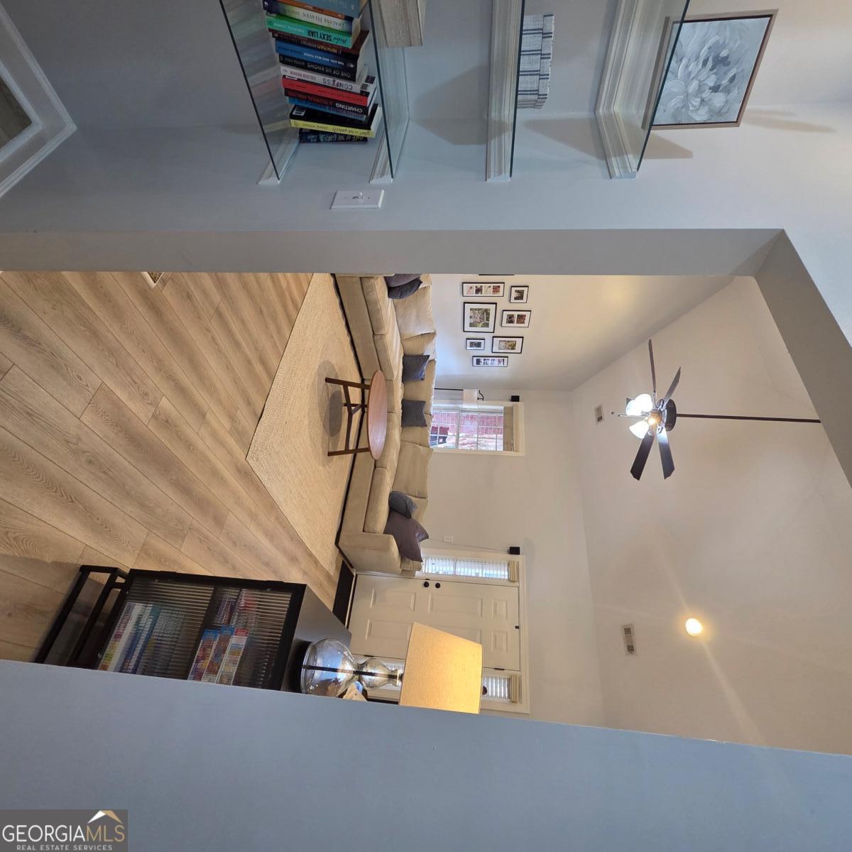 105 Cottage Grove Peachtree City, GA 30269 - Photo 6 of 13 a view of staircase with a rug