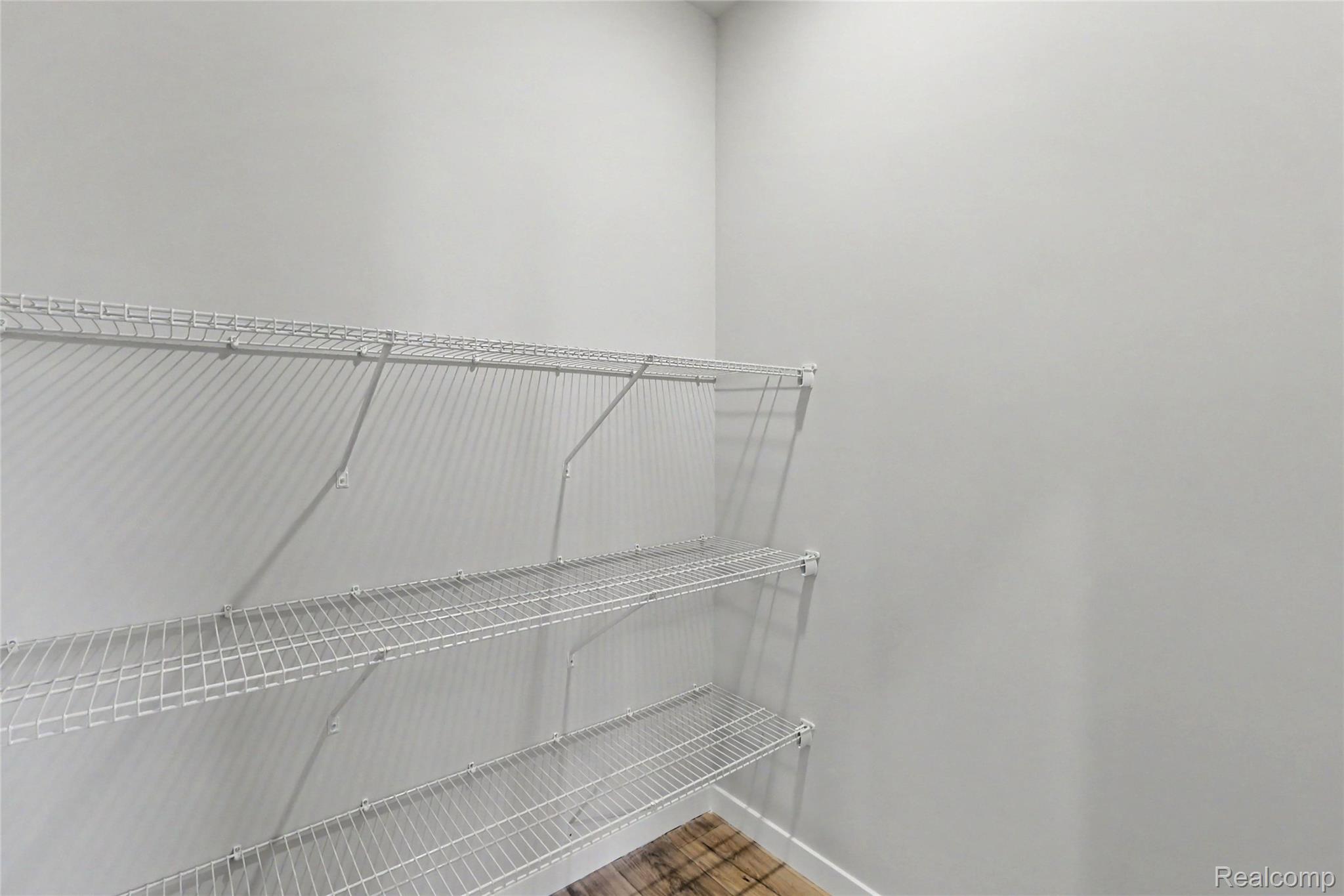 5528 Lahring Road Linden, MI 48451 - Photo 5 of 39 There is a large pantry on the upper level offering tons of storage.