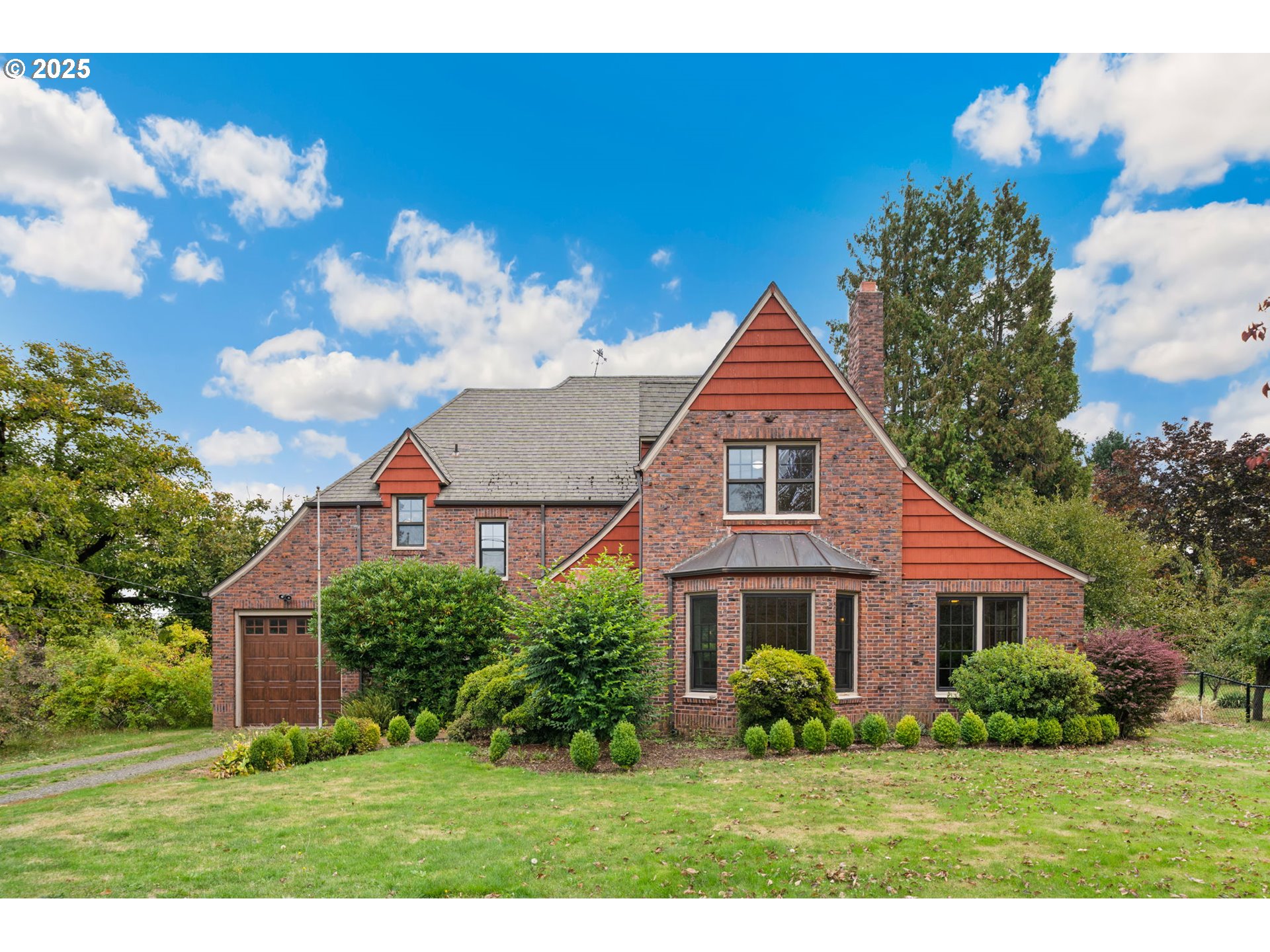 1230 Southeast Barnes Road Gresham, OR 97080 - Photo 1 of 31 a front view of a house with a yard