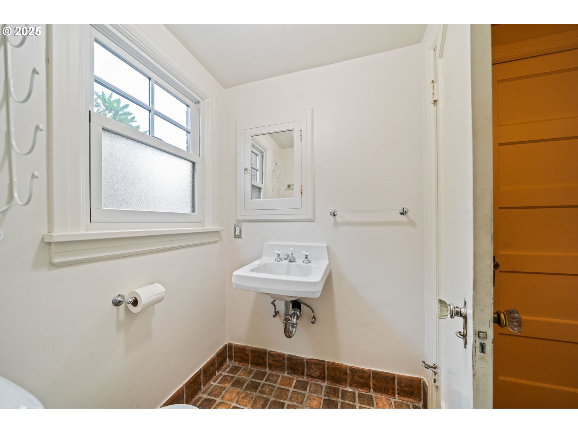 1230 Southeast Barnes Road Gresham, OR 97080 - Photo 20 of 31 a bathroom with a sink a window and a mirror