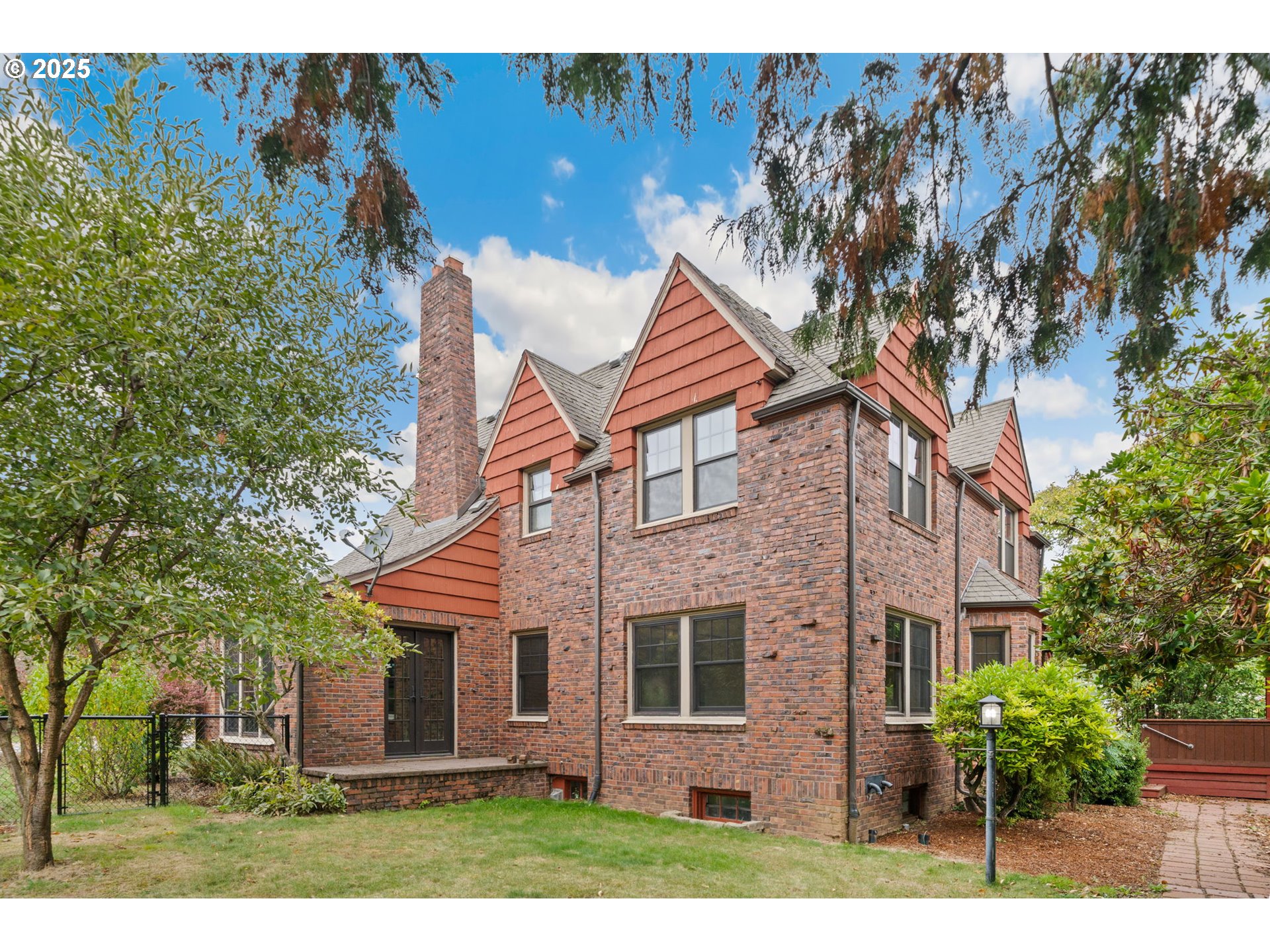 1230 Southeast Barnes Road Gresham, OR 97080 - Photo 5 of 31 front view of a house with a yard