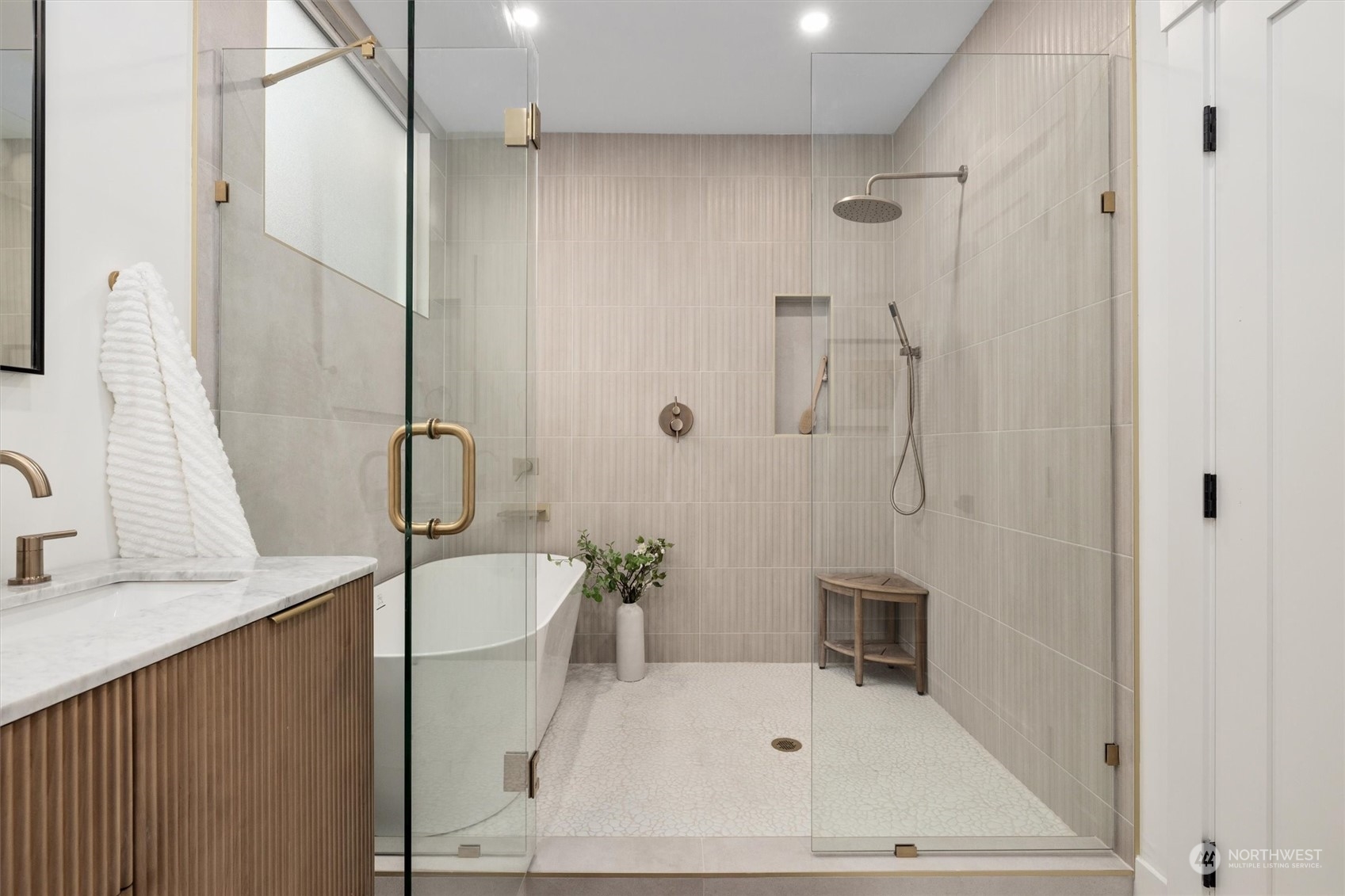 3934 Interlake Avenue North Seattle, WA 98103 - Photo 18 of 40 a bathroom with a sink a window and a shower