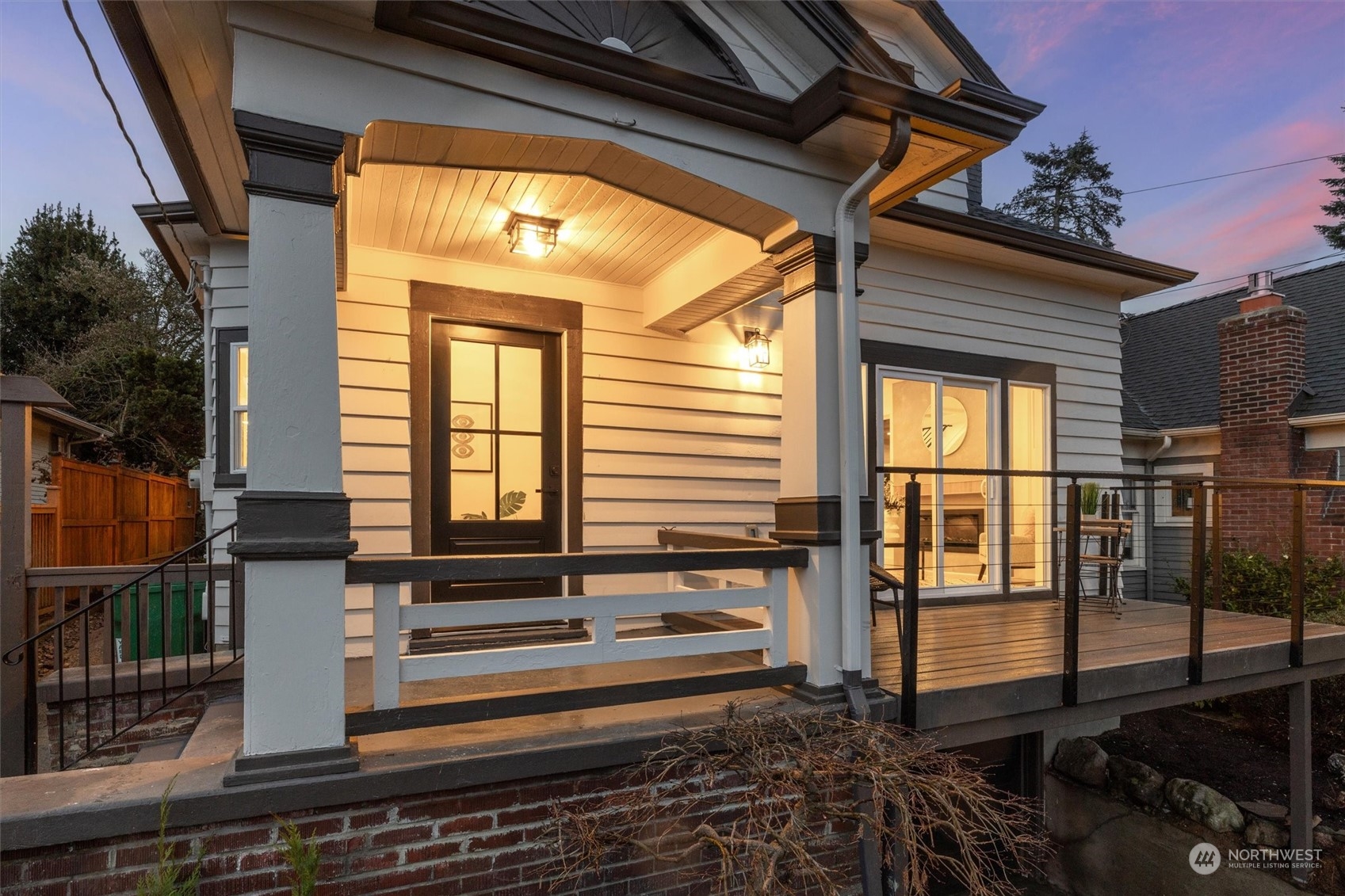 3934 Interlake Avenue North Seattle, WA 98103 - Photo 2 of 40 a front view of a house with glass windows