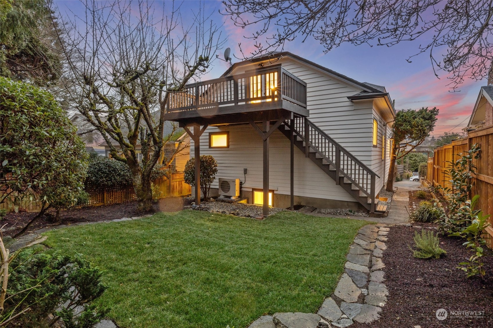 3934 Interlake Avenue North Seattle, WA 98103 - Photo 25 of 40 a view of a house with a yard