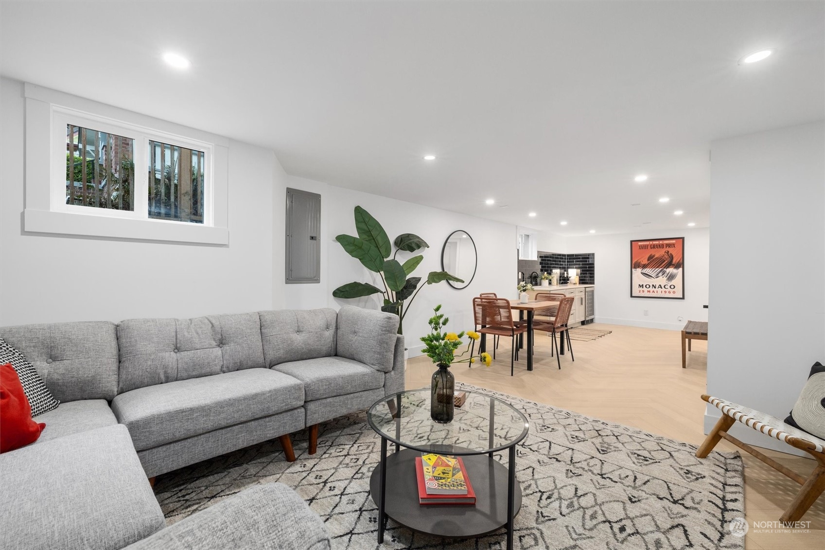 3934 Interlake Avenue North Seattle, WA 98103 - Photo 34 of 40 a living room with furniture and wooden floor