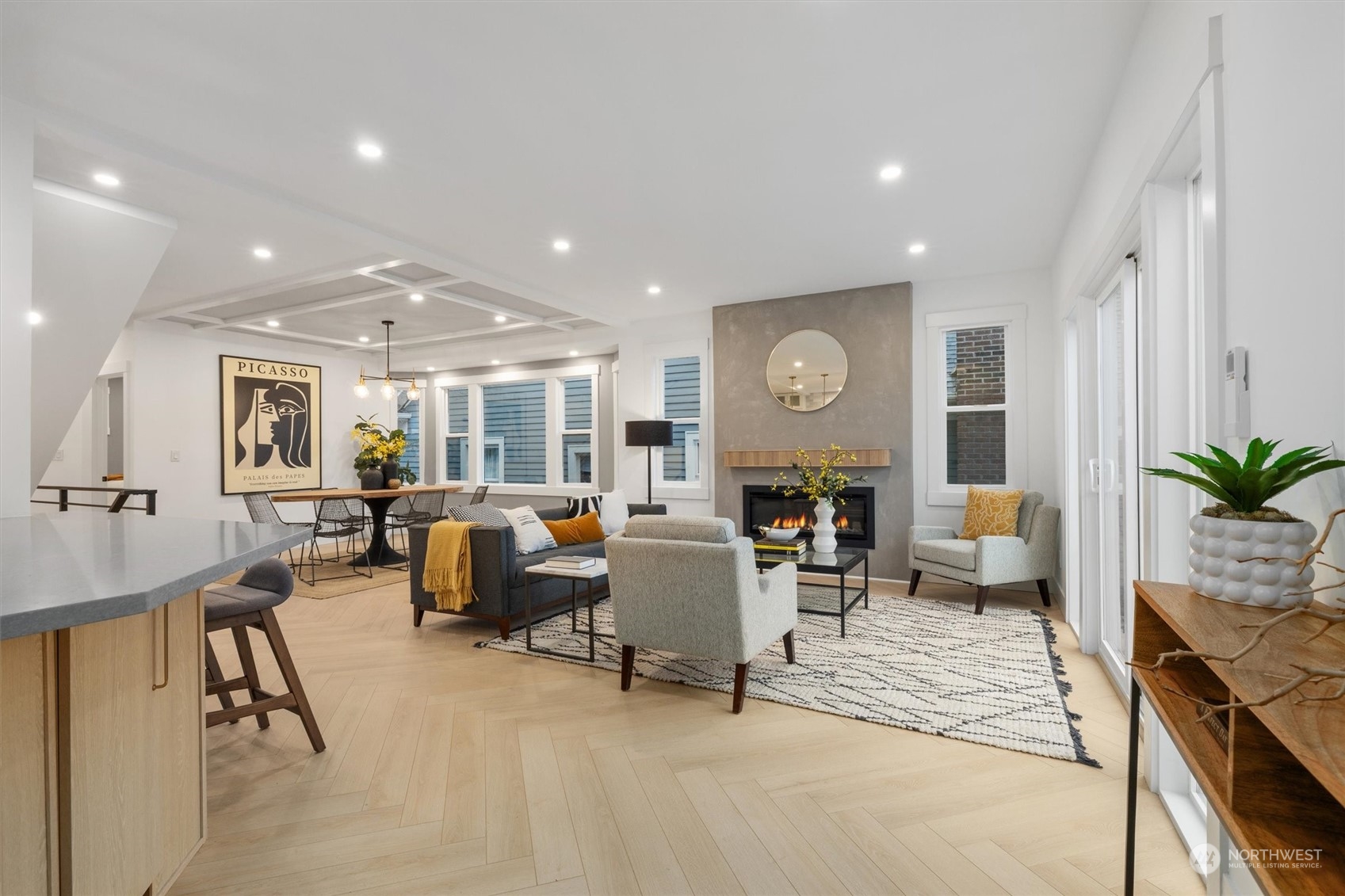3934 Interlake Avenue North Seattle, WA 98103 - Photo 4 of 40 a living room with furniture kitchen area and a fireplace