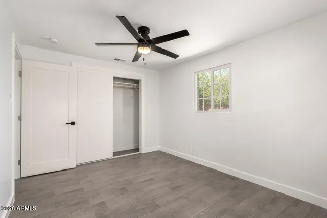 a view of a ceiling fan in a room