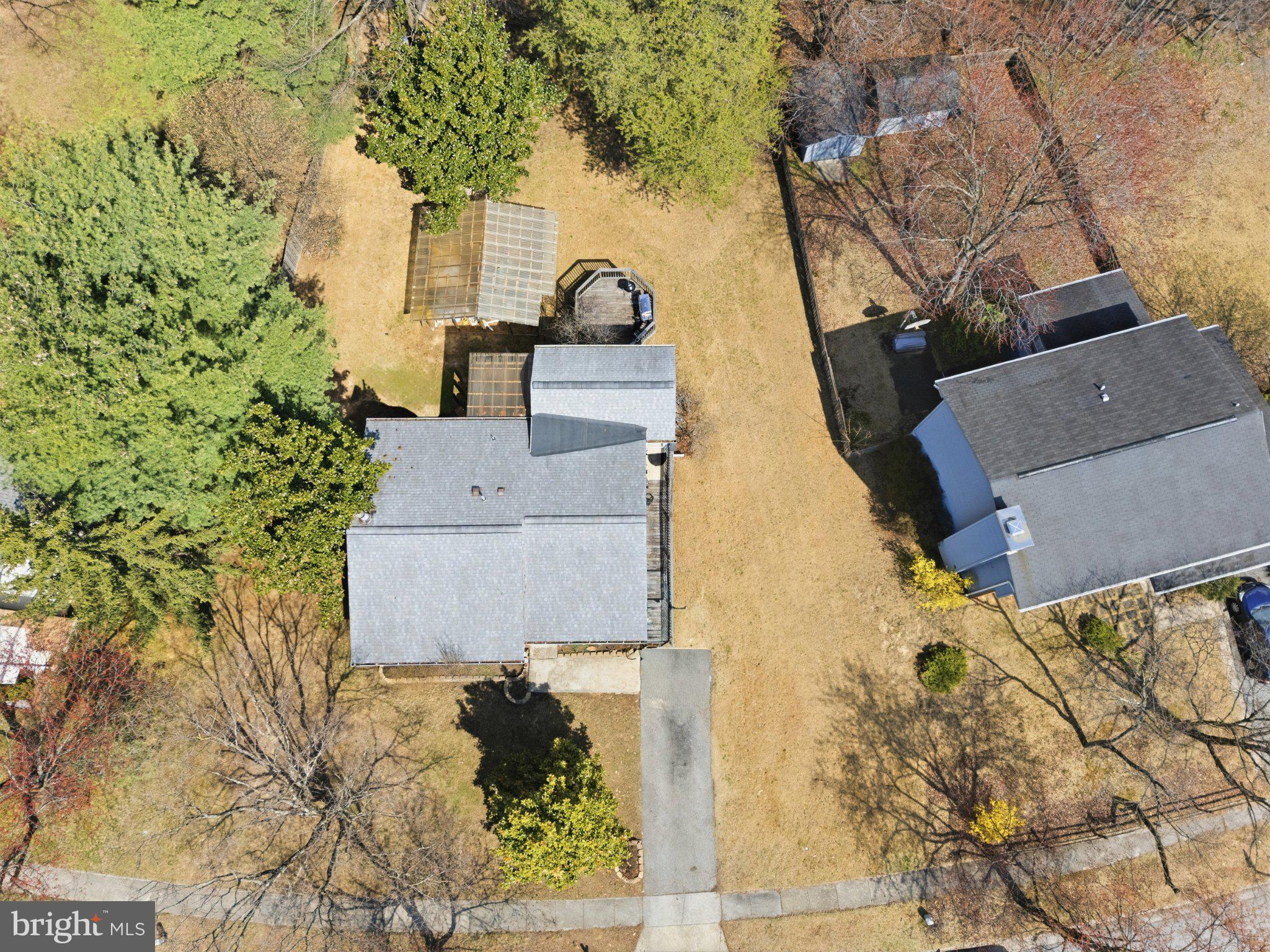 7845 Metacomet Road Hanover, MD 21076 - Photo 18 of 19 front view of a house with a yard
