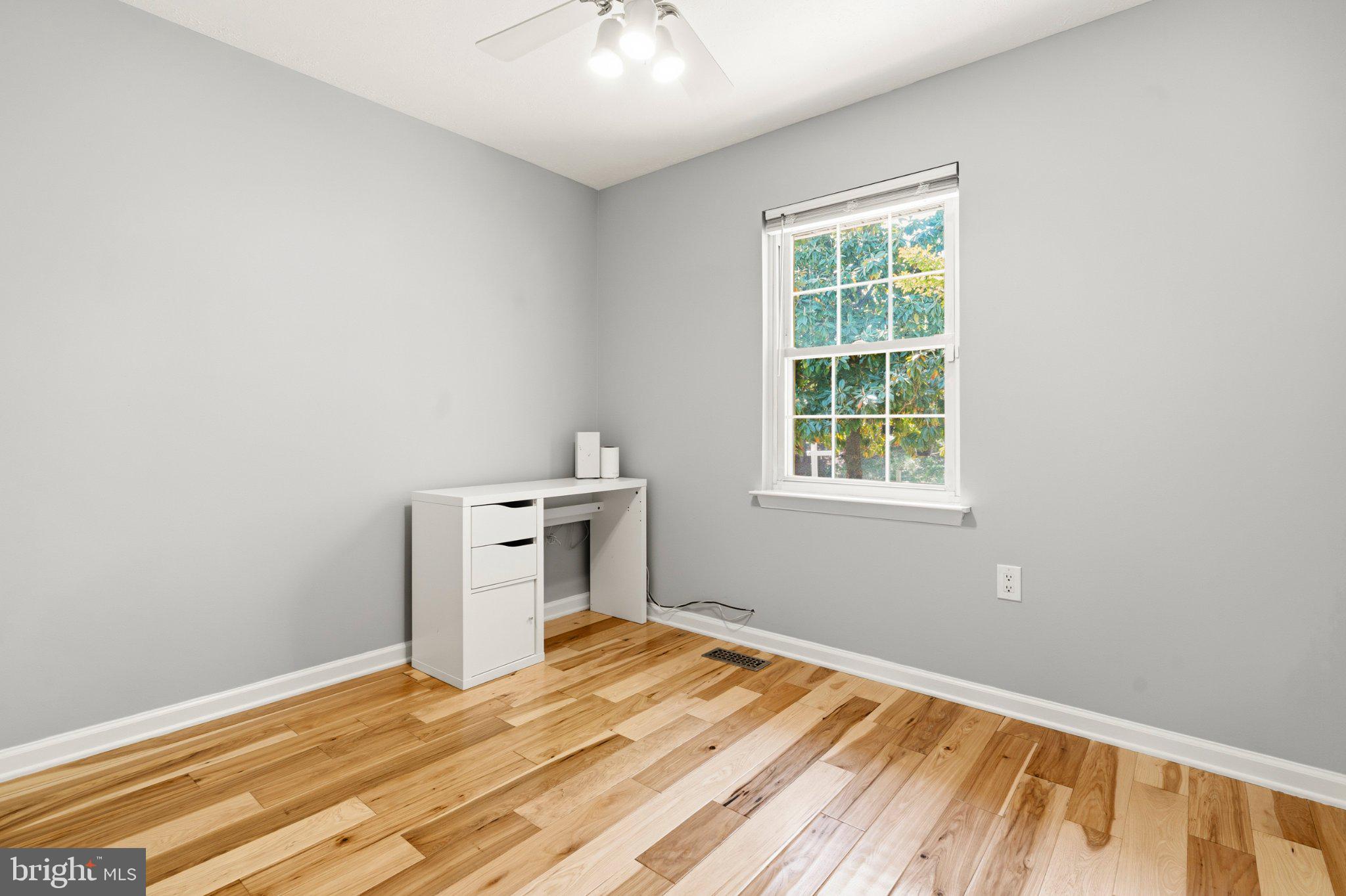 7845 Metacomet Road Hanover, MD 21076 - Photo 6 of 19 a view of a room with a bed and a window