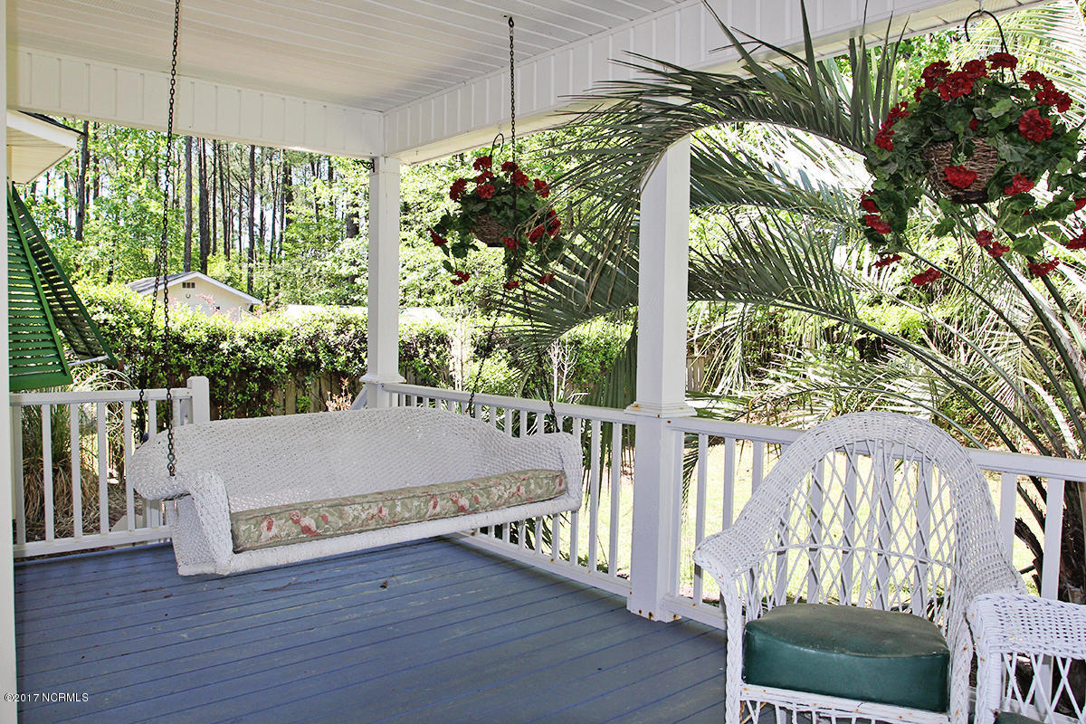 768 Straits Road Gloucester, NC 28528 - Photo 5 of 32 Front porch wraps around