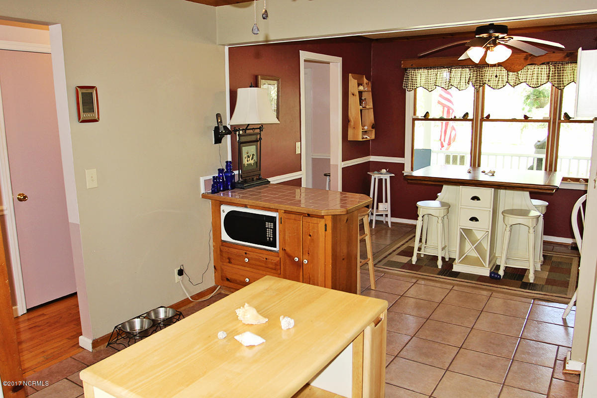 768 Straits Road Gloucester, NC 28528 - Photo 10 of 32 Kitchen open to Dining