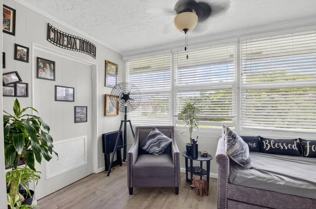 an aerial view of a house with a swimming pool yard and outdoor seating