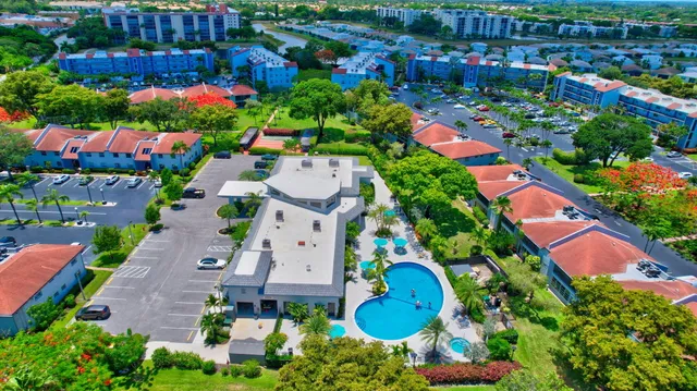 a view of house with outdoor space and garden