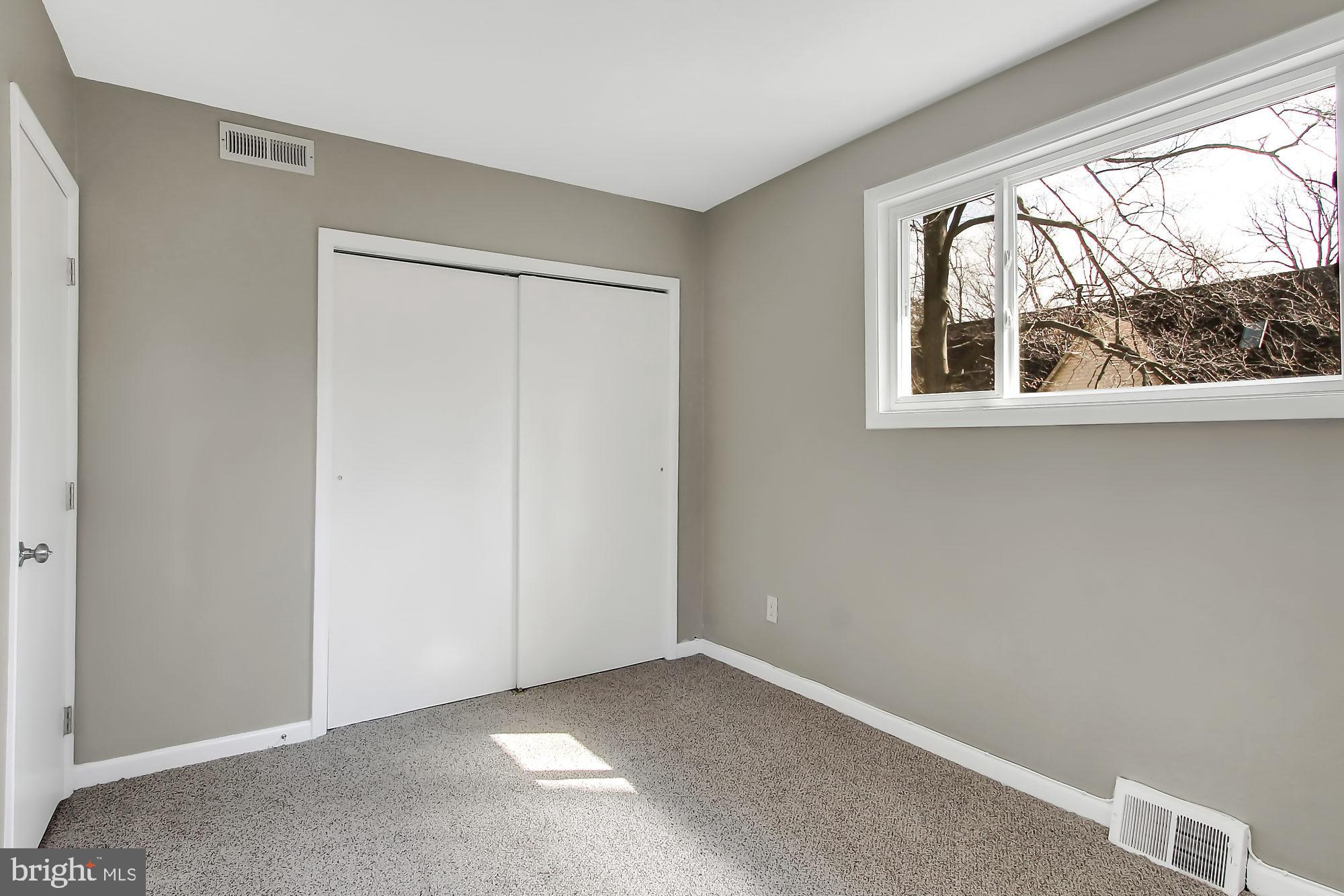 505 Epsom Road, Unit 2D Towson, MD 21286 - Photo 11 of 23 Master bedroom w/double closet, new frieze carpet