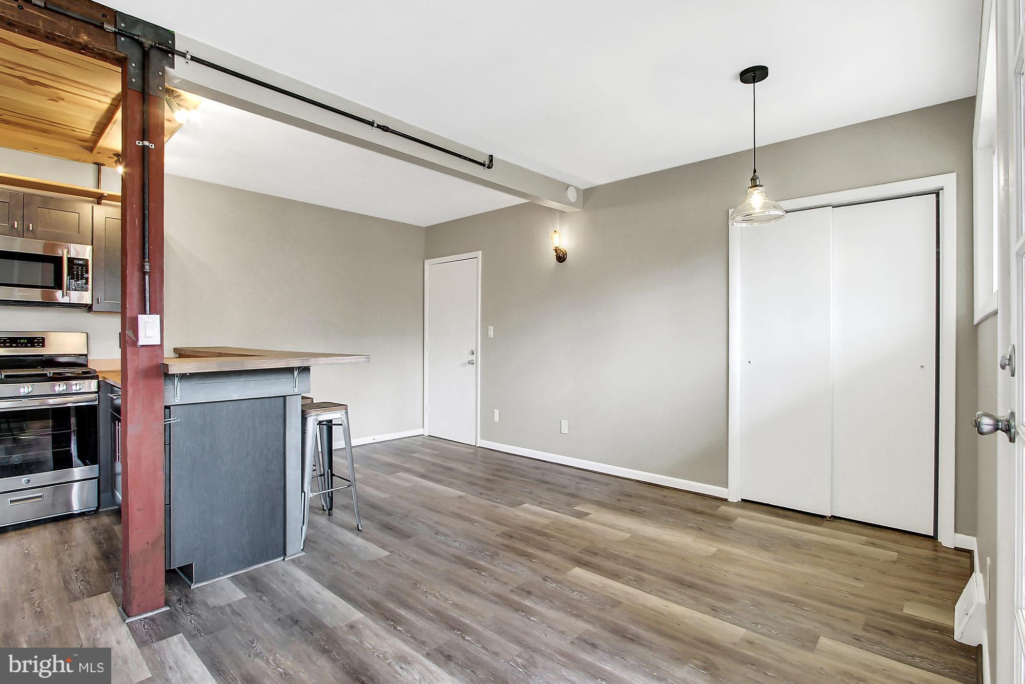 505 Epsom Road, Unit 2D Towson, MD 21286 - Photo 18 of 23 Additional table space w/stylish lighting.