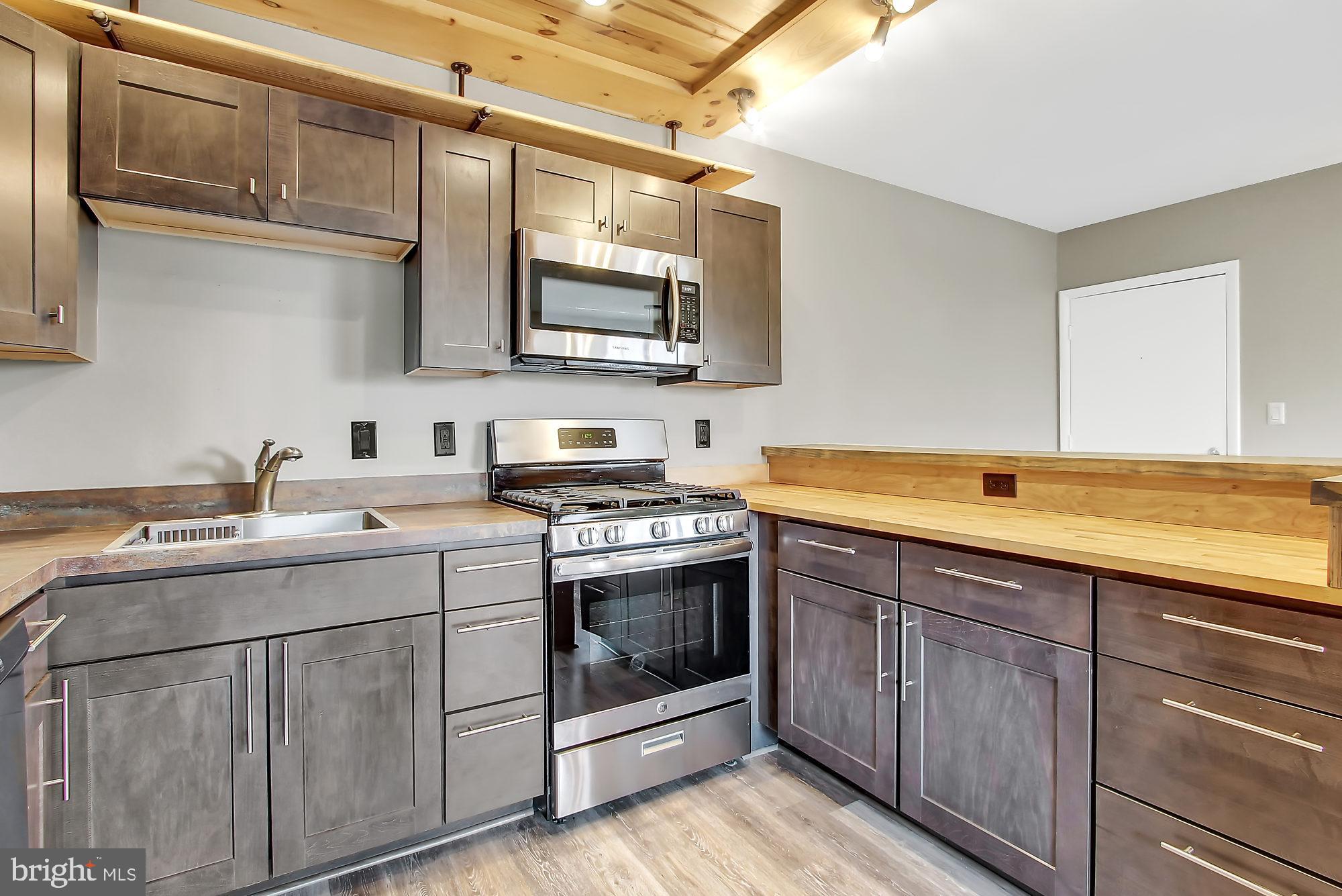 505 Epsom Road, Unit 2D Towson, MD 21286 - Photo 4 of 23 Great kitchen space for foodies & guests!