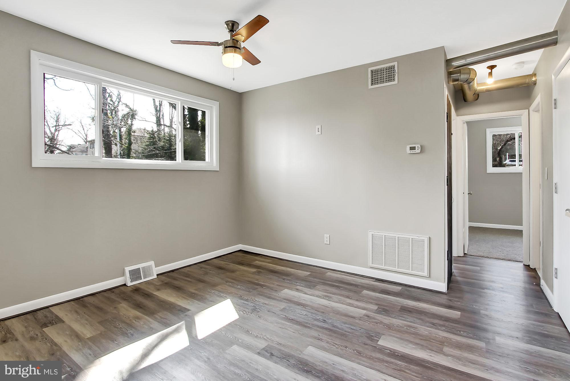 505 Epsom Road, Unit 2D Towson, MD 21286 - Photo 7 of 23 Lots of natural light-New high efficiency windows