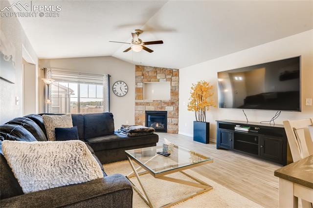 6602 Watusi Road Peyton, CO 80831 - Photo 2 of 11 Living Room/Family Room with Gas Fireplace!