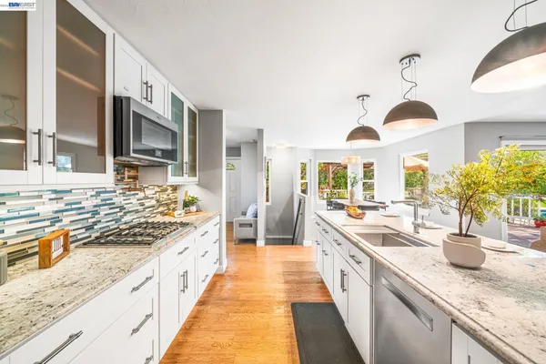 a view of a swimming pool with a yard