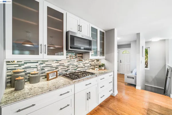 a view of a back yard with a patio