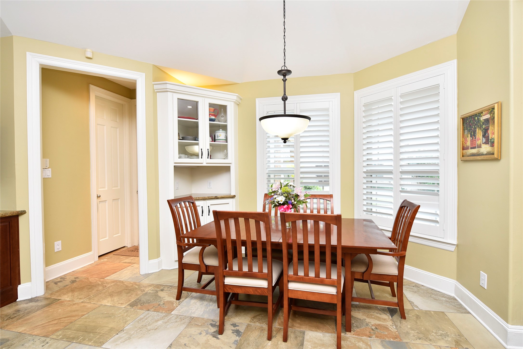 3315 Meadowside Drive Sugar Land, TX 77478 - Photo 14 of 48 a view of a dining room with furniture and window