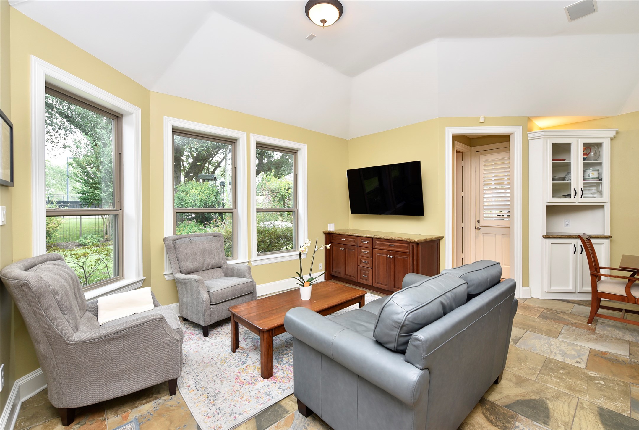 3315 Meadowside Drive Sugar Land, TX 77478 - Photo 15 of 48 a living room with furniture and a flat screen tv