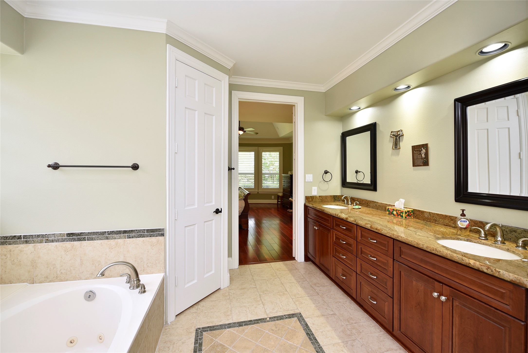 3315 Meadowside Drive Sugar Land, TX 77478 - Photo 22 of 48 a spacious bathroom with a granite countertop tub sink and mirror