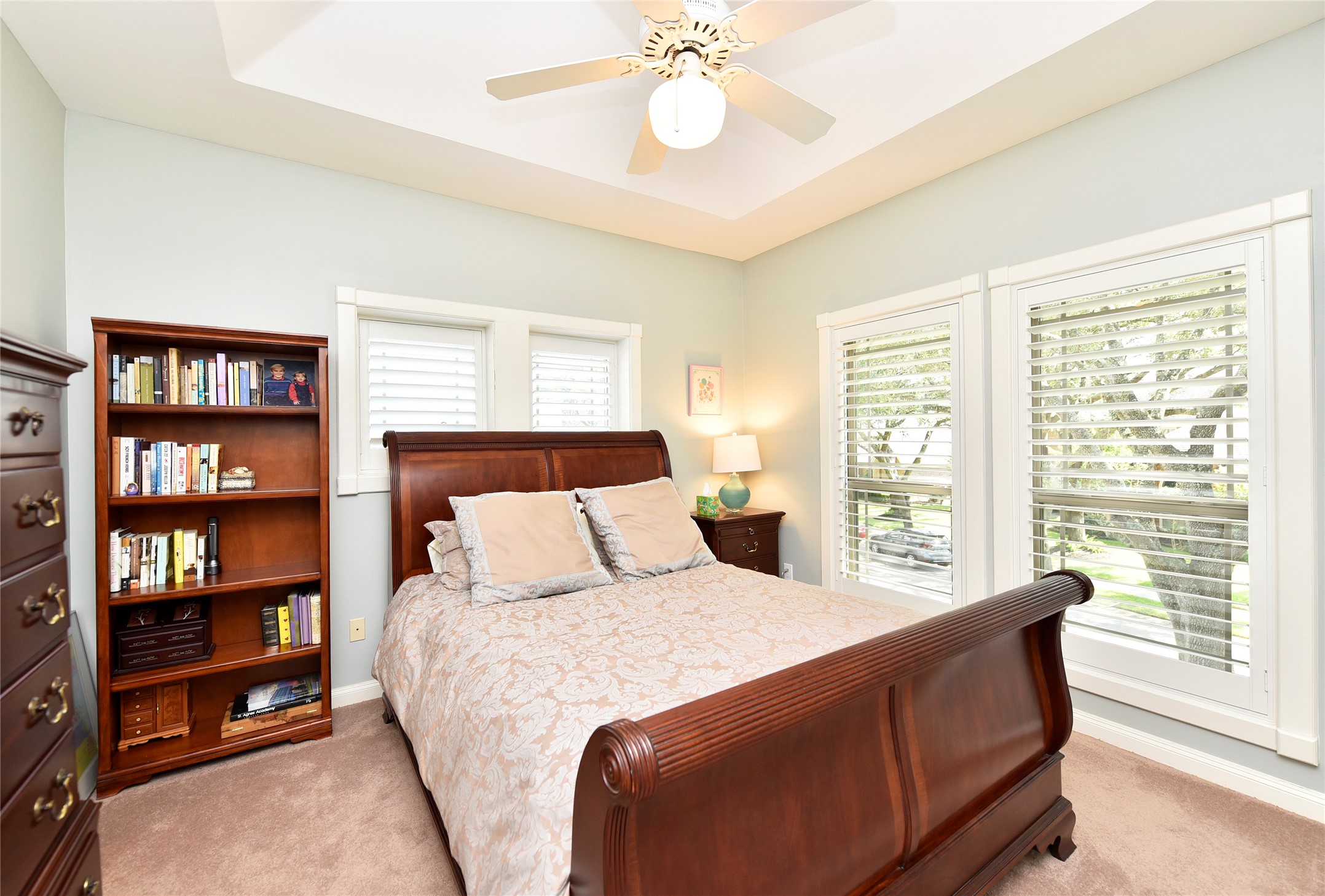 3315 Meadowside Drive Sugar Land, TX 77478 - Photo 30 of 48 a bedroom with a large bed and a large window