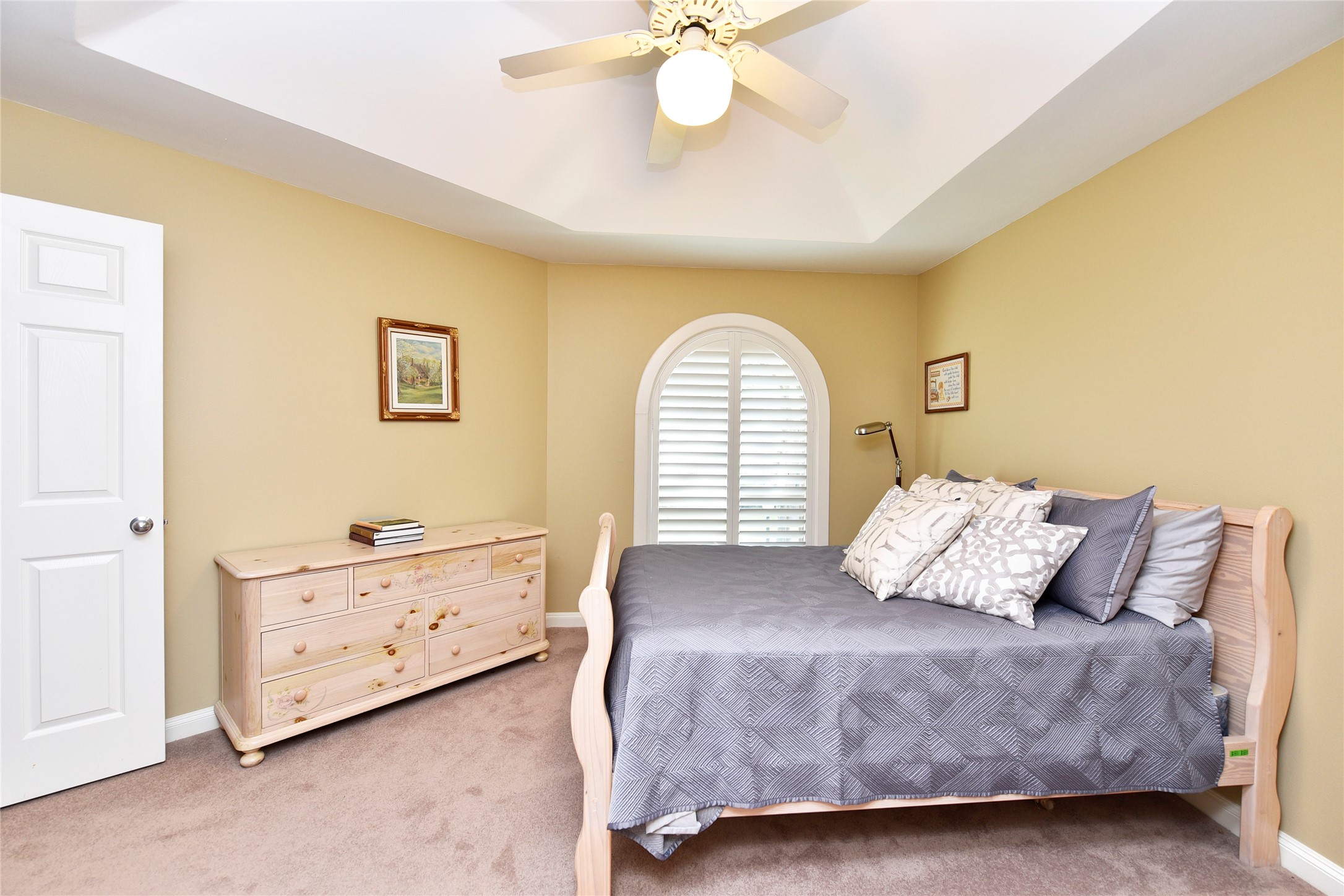 3315 Meadowside Drive Sugar Land, TX 77478 - Photo 32 of 48 a bedroom with a bed and a chandelier