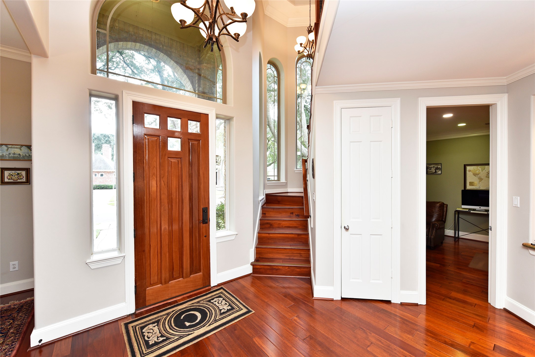 3315 Meadowside Drive Sugar Land, TX 77478 - Photo 4 of 48 a view of a hallway with wooden floor and staircase