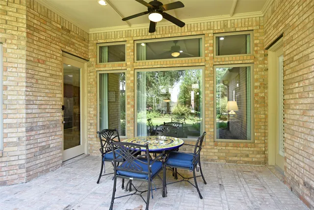 a view of a chair with a table in the patio