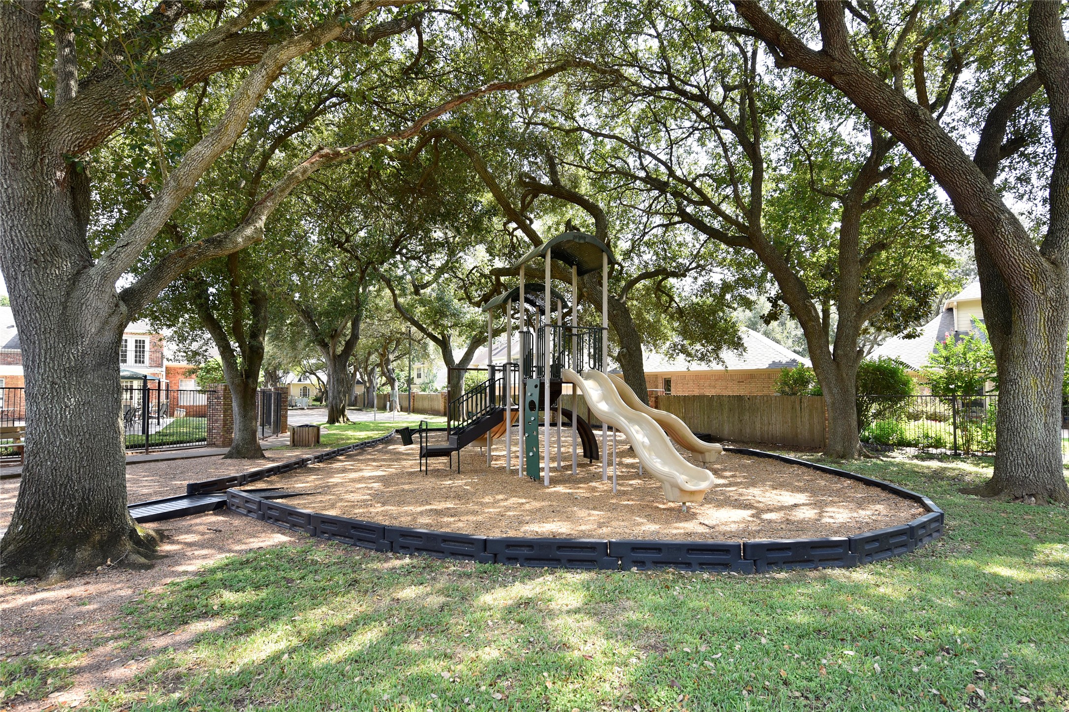 3315 Meadowside Drive Sugar Land, TX 77478 - Photo 44 of 48 a view of a playground with a tree