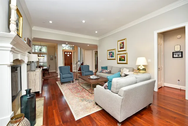 a living room with furniture and a table