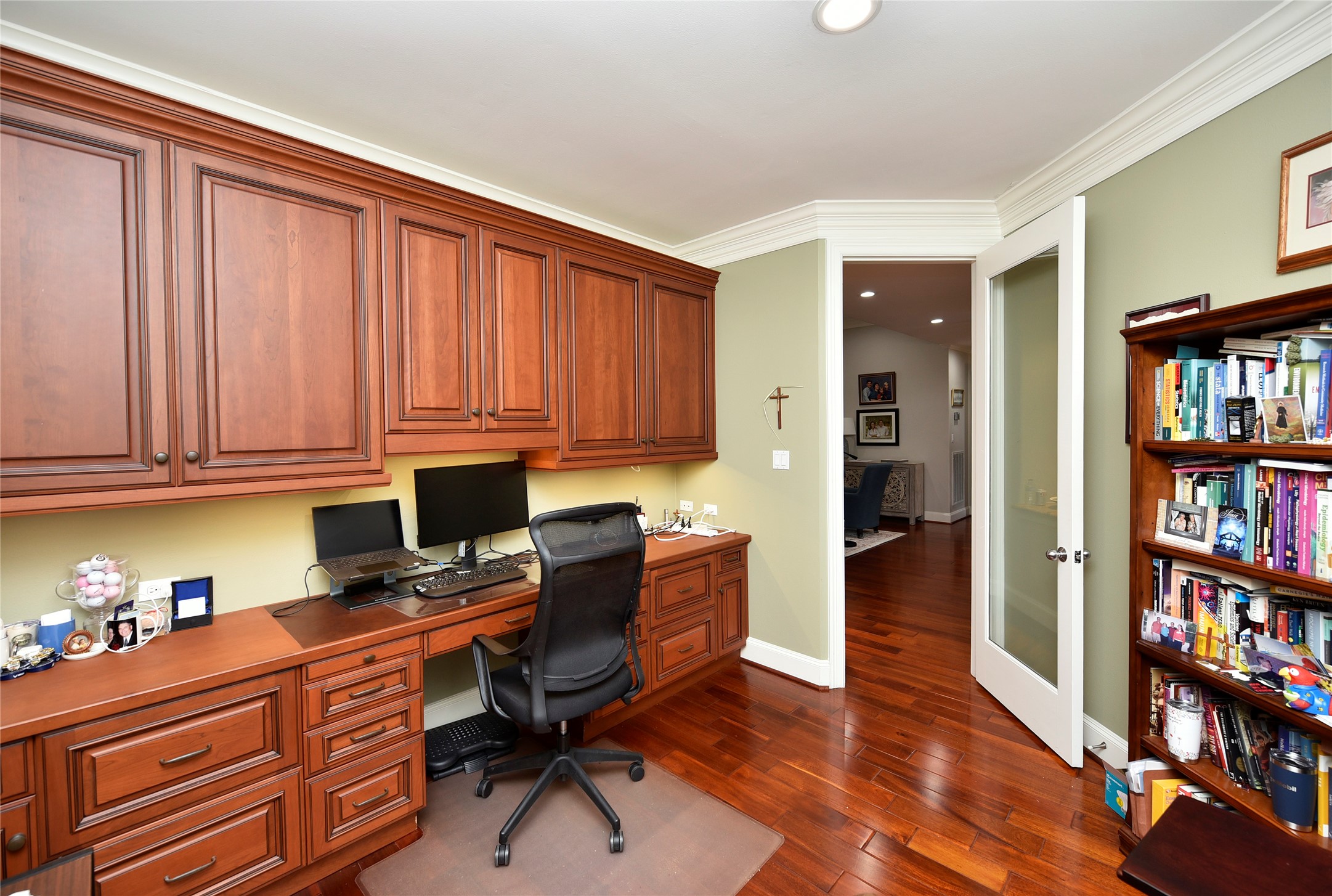 3315 Meadowside Drive Sugar Land, TX 77478 - Photo 9 of 48 a view of workspace with furniture and book shelf