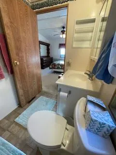 a room with wooden floor and furniture