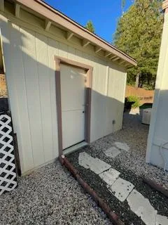 a view of a pathway with a patio