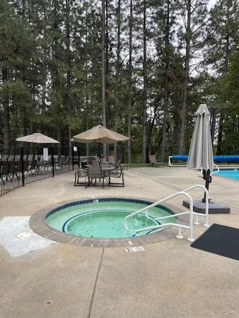 a garden with wooden fence