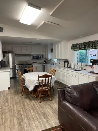 a room with pool table and flat screen tv