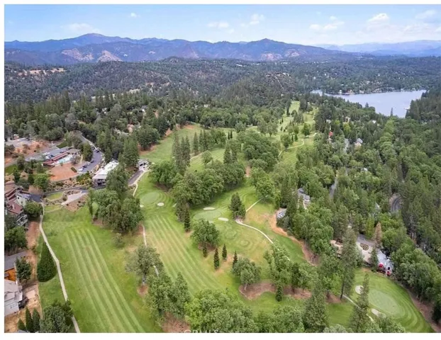 a view of a lake with trees
