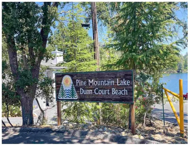 a view of a yard and front view of a house