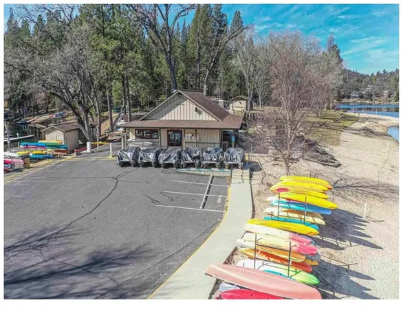 a view of the house with outdoor space and swimming pool