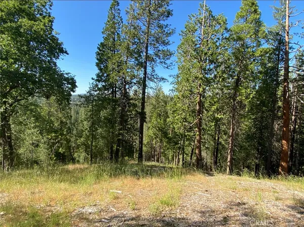 a view of swimming pool next to a lake