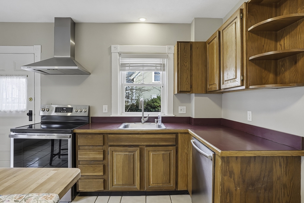 2 Maple Avenue Natick, MA 01760 - Photo 13 of 41 a kitchen with a stove and a sink