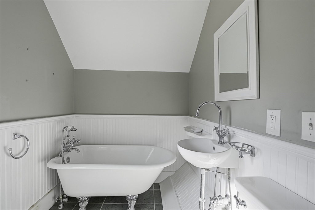 2 Maple Avenue Natick, MA 01760 - Photo 19 of 41 a bathroom with a sink and a mirror
