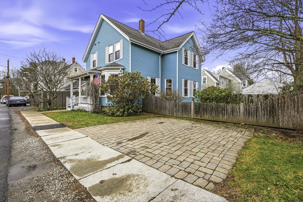 2 Maple Avenue Natick, MA 01760 - Photo 2 of 41 a front view of a house with a yard