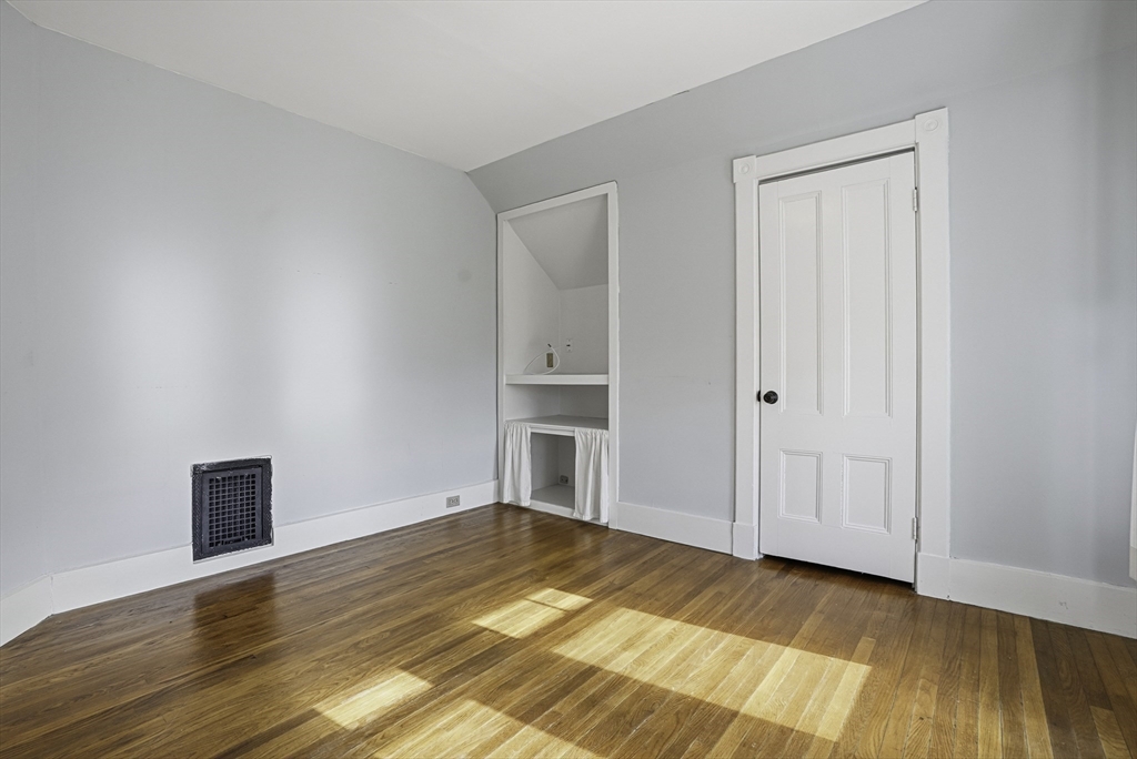 2 Maple Avenue Natick, MA 01760 - Photo 21 of 41 a view of empty room with wooden floor