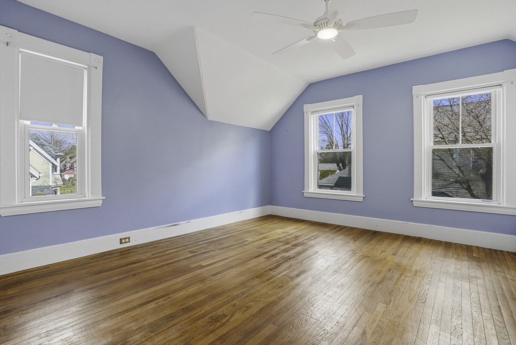 2 Maple Avenue Natick, MA 01760 - Photo 24 of 41 a view of an empty room with wooden floor and a window