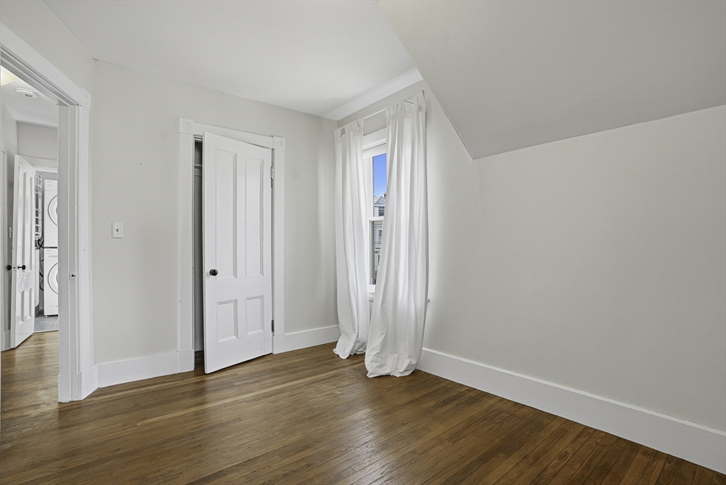 2 Maple Avenue Natick, MA 01760 - Photo 31 of 41 a view of an empty room with wooden floor and closet